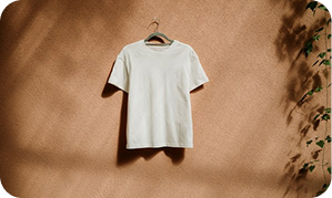 White t-shirt hanging on a hanger