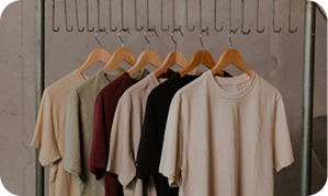 Neutral t-shirts hanging on a rack